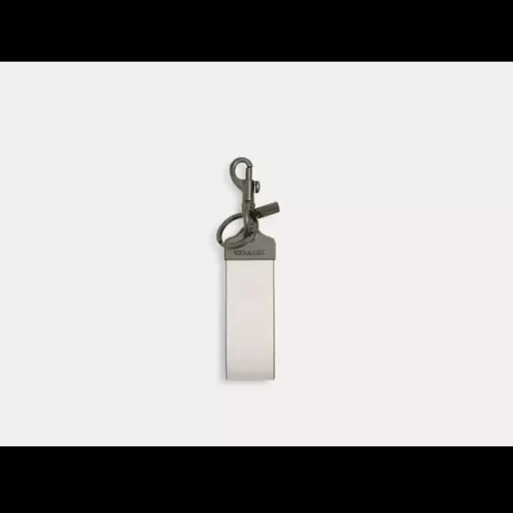 Coach leather keychain with gunmetal hardware.